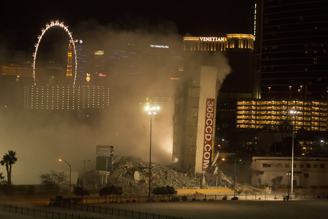 The elevator shaft remains standing shortly after the Clarion Hotel and Casino at 205 Convention Center Drive was imploded in the early morning hours of Tuesday, Feb. 10, 2015. (Jeff Scheid/Las Ve ...