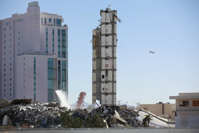 What remains of The Clarion hotel-casino is seen after a demolition crew worked to bring down part of the structure after an early-morning implosion failed to fully bring down the building at 305  ...