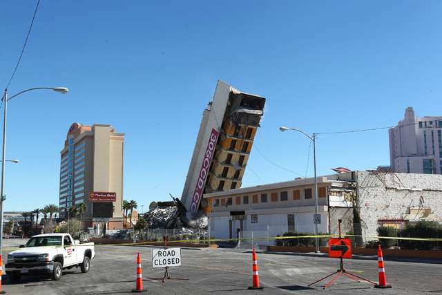 Most of remaining portion of The Clarion hotel-casino is brought down by a demolition crew after an early-morning implosion failed to fully bring down the building at 305 Convention Center Drive i ...