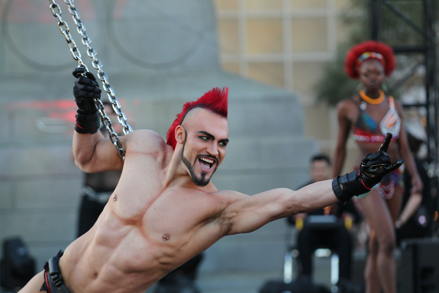 Aerialist Brandon Pereyda of Cirque du Soleil's Zumanity performs a portion of the show outside of the New York-New York hotel-casino in Las Vegas on Thursday, Feb. 26, 2015. The show includes new ...