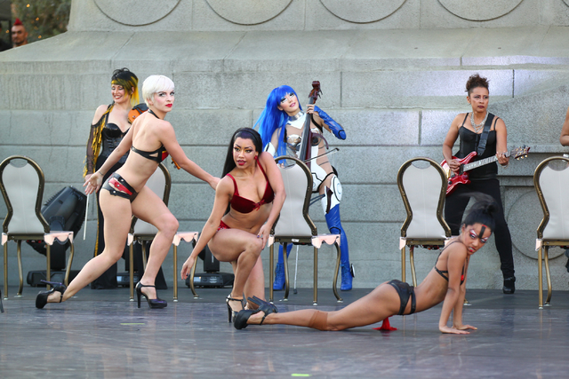 Cast members of Cirque du Soleil's Zumanity perform a portion of the show outside of the New York-New York hotel-casino in Las Vegas on Thursday, Feb. 26, 2015. The show includes new choreography  ...