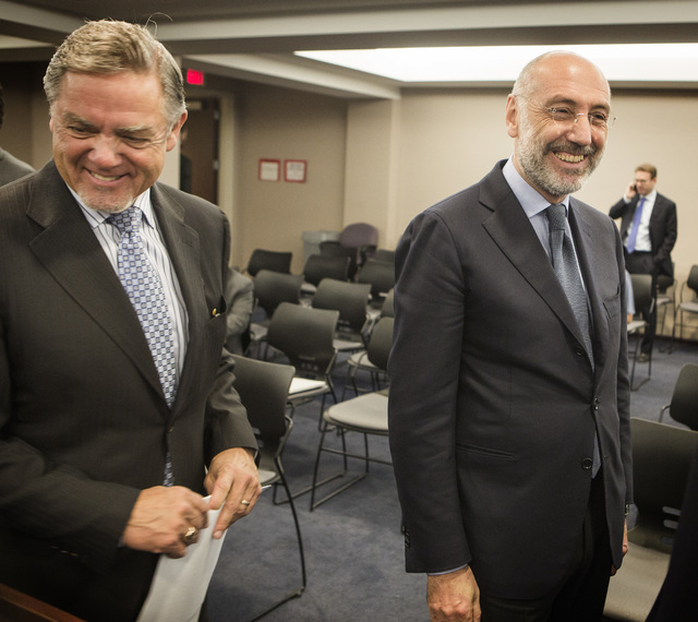 Phil Satre, left, International Game Technology chairman, and Marco Sala, CEO of GTECH Holdings, during a special Gaming Control Board Hearing on the licensing of the GTech-IGT merger/buyout  at t ...