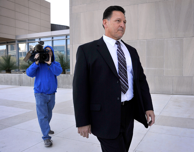 Former Family Court Judge Steven Jones arrives at U.S. Federal Court in Las Vegas Wednesday, Feb. 25, 2015. Jones was scheduled to appear for sentencing in a nearly $3 million investment scheme. ...
