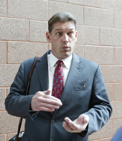 Attorney Mark Coburn answers questions at the Regional Justice Center, Thursday, Feb. 26, 2015. Coburn and another Las Vegas attorney, Scott Holper, engaged in a verbal altercation in Justice Cour ...