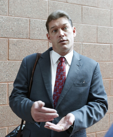 Attorney Mark Coburn answers questions at the Regional Justice Center, Thursday, Feb. 26, 2015. Coburn and another Las Vegas attorney, Scott Holper, engaged in a verbal altercation in Justice Cour ...