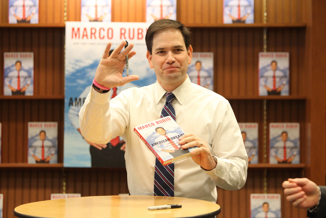 U.S. Sen. Marco Rubio, R-Fla., waves during a book signing of his book, American Dreams: Restoring the Land of Opportunity, at Barnes and Noble, 2191 N. Rainbow Blvd. Wednesday, Feb. 18, 2015. (Er ...