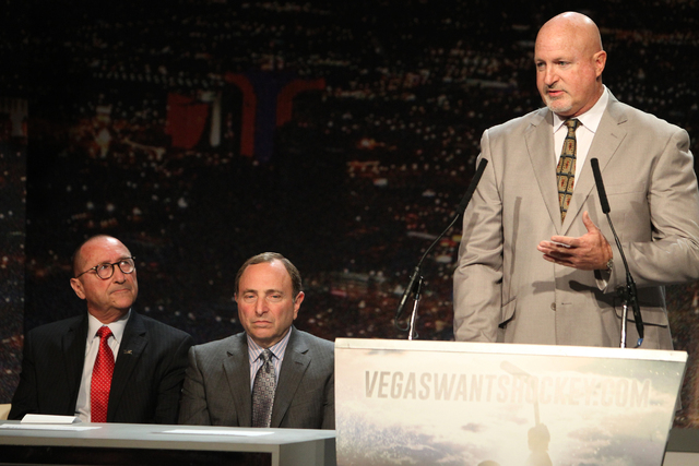 Rossi Ralenkotter, from left, president of Las Vegas Convention and Visitors Authority, NHL Commissioner Gary Bettman, listen to Mark Prows, senior vice president arenas at MGM Resorts, during the ...