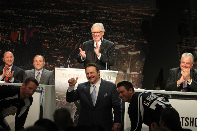 Bill Foley, center rear, announces the launch of the NHL team ticket deposit drive for a Las Vegas team, with Rossi Ralenkotter, from left, president of Las Vegas Convention and Visitors Authority ...