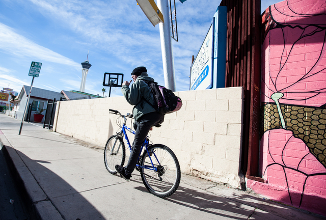 Russell Yeager bikes along 3rd Street near Imperial Avenue in search of a local shop specializing in occult and artisan goods in the downtown area of Las Vegas on Friday, Jan. 16, 2015. Yeager has ...