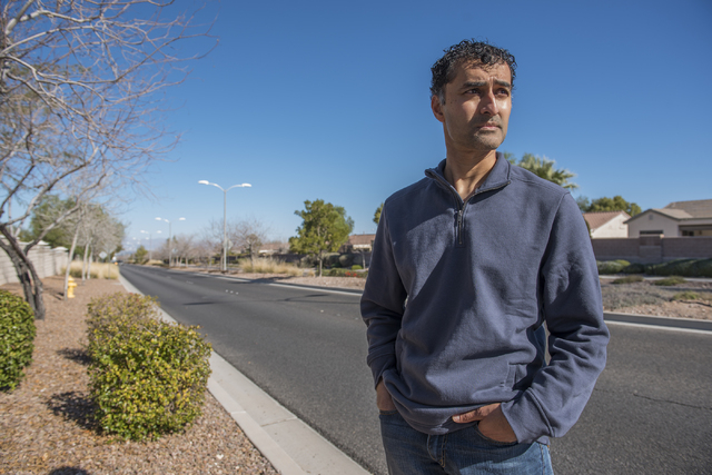 Sun City Anthem resident Sam Vott reflects on his concerns regarding a proposed medical marijuana dispensary near his home from the Anthem Hills Professional Plaza in Henderson, Nev. on Saturday F ...