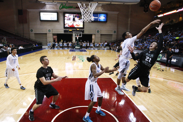 Canyon Springs guard Jordan Davis defends a shot by Palo Verde guard Taylor Miller during their Division I state semifinal game Thursday, Feb. 26, 2015, at the Orleans Arena. (Sam Morris/Las Vegas ...