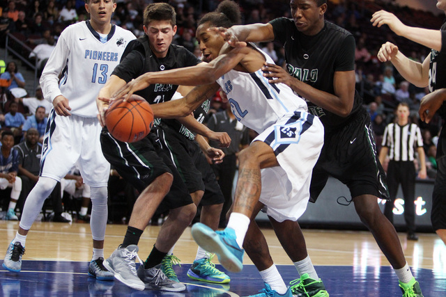 Canyon Springs forward Maurice Hunter battles Palo Verde's Connor Lemmon for a rebound during their Division I state semifinal game Thursday, Feb. 26, 2015, at the Orleans Arena. (Sam Morris/Las V ...
