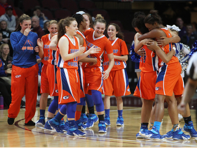 Bishop Gorman players celebrate their 39-35 defeat of Liberty in their Division I state semifinal game Thursday, Feb. 26, 2015, at the Orleans Arena.  (Sam Morris/Las Vegas Review-Journal)