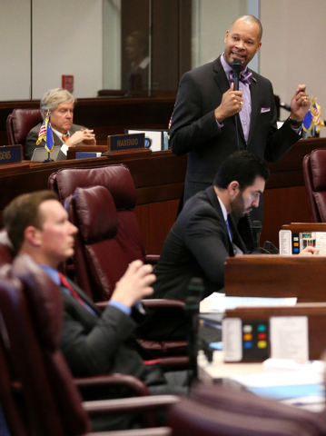 Nevada Senate Minority Leader Aaron Ford, D-Las Vegas, speaks on the Senate floor against a bill that will exempt school and university construction projects from prevailing wage laws, at the Legi ...