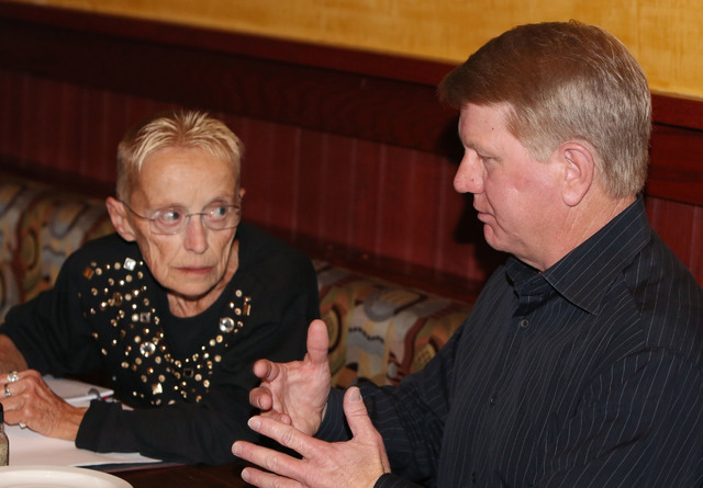 Jim Marchant, right, talks to AJ Maimbourg, recall organizer, on Thursday, Feb. 19, 2015. Marchant hopes to run against Assemblyman John Hambrick, R-Las Vegas, in a potential recall election for t ...