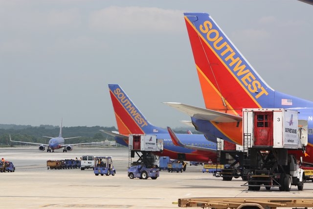Southwest Airlines jets sit on the tarmac at a gate of Baltimore-Washington International Airport. (CNN)