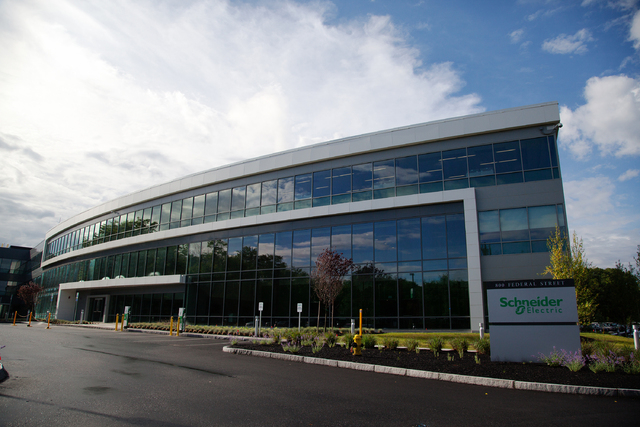 Schneider Electric’s North American headquarters, known as Boston One Campus, is seen in Andover, Mass. on Sept. 10, 1014. Schneider Electric has been signed as the first founding sponsor f ...