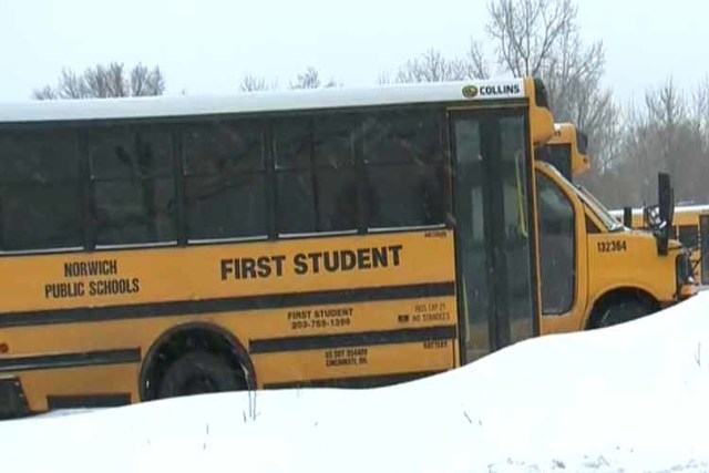 A bus driven by Edwin Gonzalez crashed into a parked motor vehicle in Norwich, Conn., on Friday, Feb. 6, 2015. (Screengrab/WTNH News8/YouTube)