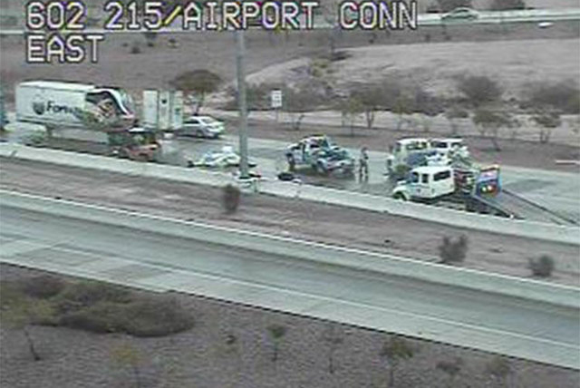 An overturned box truck on the 215 Beltway near the airport connector was backing up traffic early Monday morning. (Courtesy/RTC FAST Cameras)
