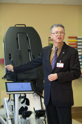 Chief Medical Officer Dr. Tony Chin explains how the Erigo robot works in the inpatient rehabilitation facility at St. Rose Dominican Hospitals Rose de Lima campus, 102 E. Lake Mead Parkway. (Spec ...