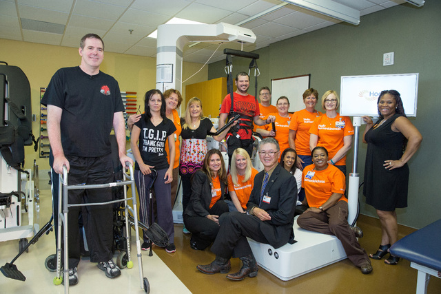 Staff pose with former patients in the inpatient rehabilitation facility at St. Rose Dominican Hospitals Rose de Lima campus, 102 E. Lake Mead Parkway. (Special to View)