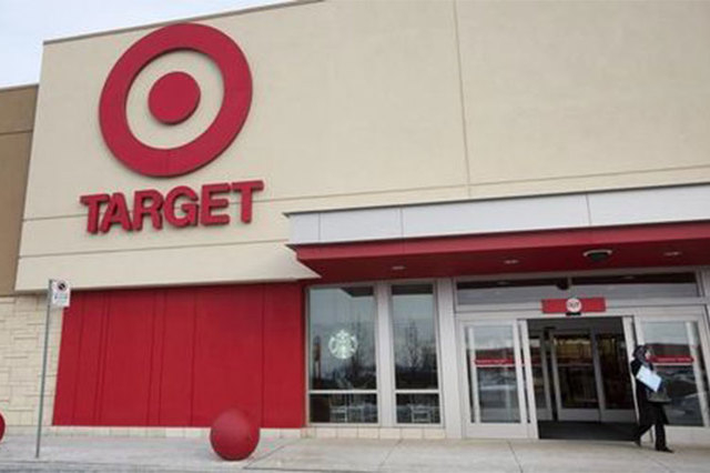 Target Corp. announced Monday it is cutting in half the amount needed for online orders to be eligible for free shipping, undercutting Amazon.com and Wal-Mart. (Reuters/Peter Power)