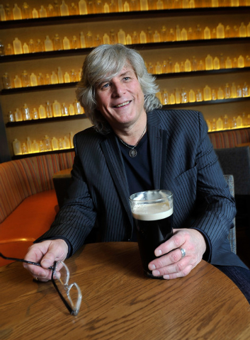 Tom Ryan, founder of Tom's Urban enjoys a glass of beer as he sits in his recently opened restaurant at the New York New York hotel-casino on Tuesday, Feb. 17, 2015.  Ryan also founded the popular ...