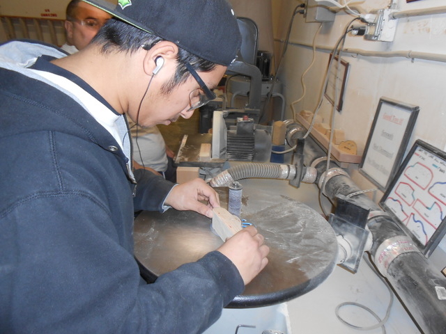 Toys 4 Smiles volunteer David Flores works at a groover Dec. 30, 2014, at the group's wood shop. The nonprofit is looking for a new location as its current one has no heat in the winter and no air ...