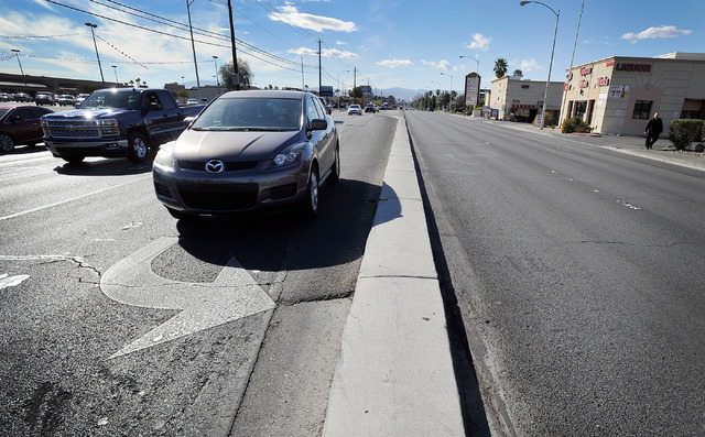 Vehicle traffic moves along East Tropicana Avenue near Pecos Avenue in Las Vegas on Thursday, Feb. 26, 2015. Median barriers are scheduled to be built over the next four years to prevent people fr ...