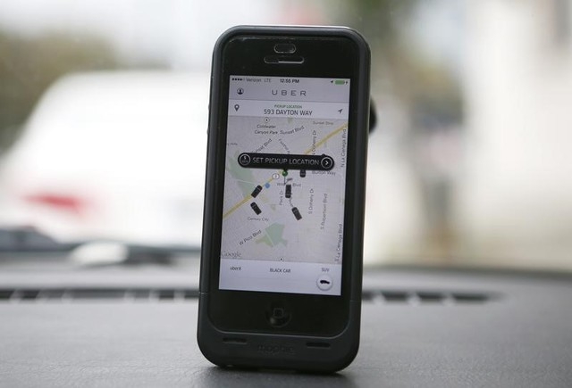 An Uber app is seen on an iPhone in Beverly Hills, California, Dec. 19, 2013. (Lucy Nicholson/Reuters file)
