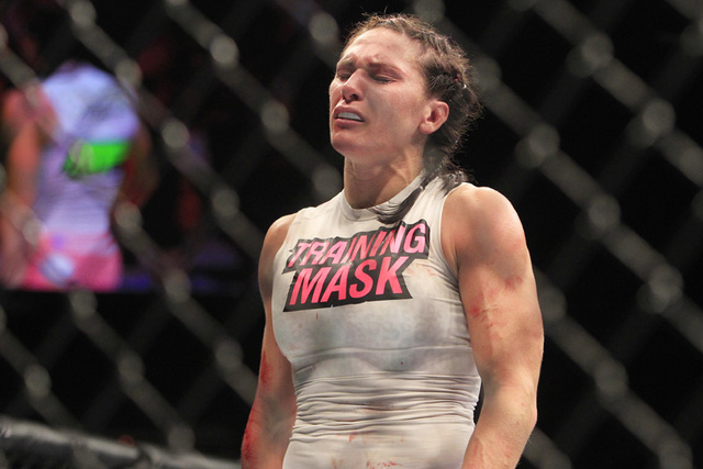 Cat Zingano reacts after getting a TKO of Amanda Nunes in their fight at UFC 178 Saturday, Sept. 27, 2014 at the MGM Grand Garden Arena in Las Vegas. (Sam Morris/Las Vegas Review-Journal)