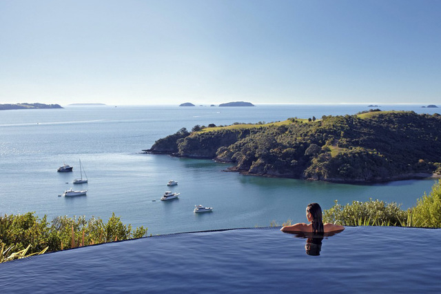 Waiheke Island's sheltered beaches, emerald bays and two dozen boutique wineries has many vacationers bypassing Auckland altogether. Delamore Lodge's infinity pool is a particulary romantic sunset ...