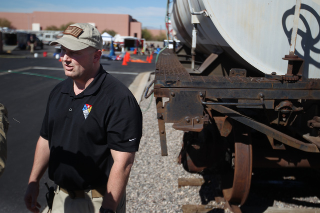 Maj. Brett Compston talks about Nevada National Guard's 92nd Civil Support Team's emergency preparedness drill Wednesday, Feb. 25, 2015. (Sam Morris/Las Vegas Review-Journal)