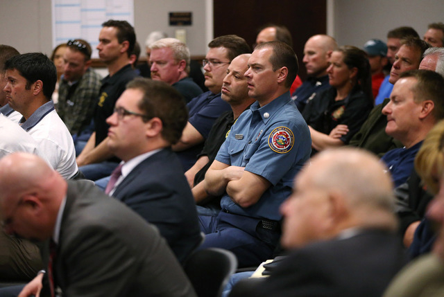 Several hundred representatives from state police, fire and labor organizations attend a hearing at the Legislative Building in Carson City, Nev., on Monday, Feb. 23, 2015. Lawmakers are consideri ...