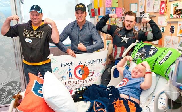 It was their second hospital visit as part of a Super Bowl bet that ended in a win for everyone. (Courtesy, Seattle Children's Hospital/Facebook)