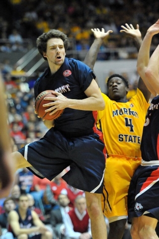 Mar 7, 2015; Nashville, TN, USA; Belmont Bruins forward Mack Mercer (25) gets the rebound against Murray State Racers forward Jarvis Williams (4) during the first half at Nashville Municipal Audit ...