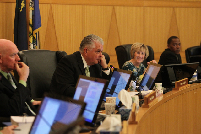Clark County Commissioners from left, Larry Brown, Steve Sisolak, Susan Brager, and Lawrence Weekly, listen to No Kill Las Vegas organization supporters during a Clark County Commission meeting in ...