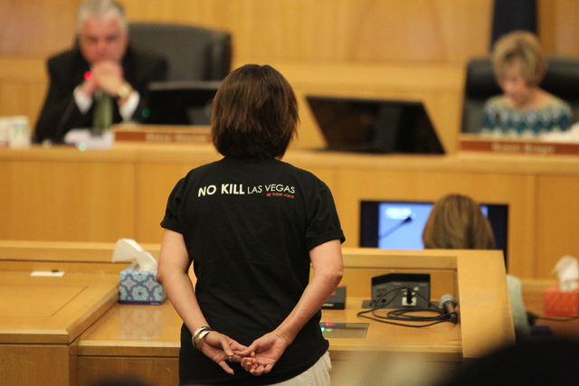 A No Kill Las Vegas organization supporter speaks during public comment at a Clark County Commission meeting inside the Clark County Commissioner chambers in Las Vegas Tuesday, March 17, 2015. Cla ...