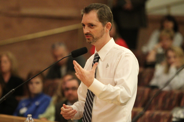No Kill Las Vegas organization president Bryce Henderson presents details for their no kill project during a Clark County Commission meeting inside the Clark County Commissioner chambers in Las Ve ...