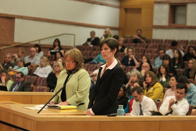 Christine Robinson, right, executive director of The Animal Foundation, with consultant Bonnie Rinaldi, speak during a Clark County Commission meeting inside the Clark County Commissioner chambers ...