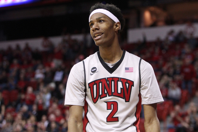 UNLV guard Patrick McCaw smiles as the Rebels pull ahead of Wyoming during the second half of their Mountain West Conference game Saturday, Feb. 28, 2015, at the Thomas & Mack Center.  UNLV won th ...