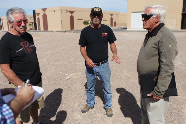 Ridge View Industrial Park building owners Craig Bauske, left, and Howard Howe, with Jim Anderson, president for Calico Ridge Home Owners Association, speak on their opposition for a proposed Bell ...