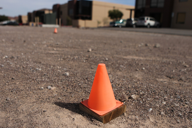 Cones mark where a fuel tank is planned to be installed if a Bell Creameries distribution center is approved by Henderson City Council according to Jim Anderson, president for Calico Ridge Home Ow ...