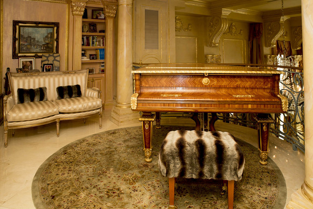 Tonya Harvey/Real Estate Millions 
A second-story cantilever housing an Old World-looking grand piano that would fit in nicely in the old Liberace Museum is directly above the kitchen and overlook ...