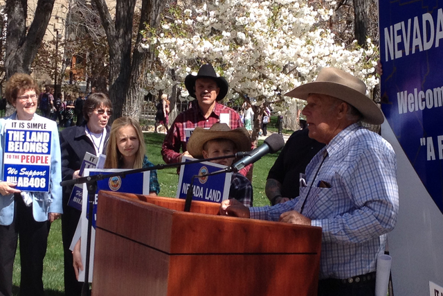 Cliven Bundy, far right, speaks at a rally challenging federal control of Nevada public lands outside the Legislative Building in Carson City on Tuesday, March 31, 2015. (Sean Whaley/Las Vegas Rev ...