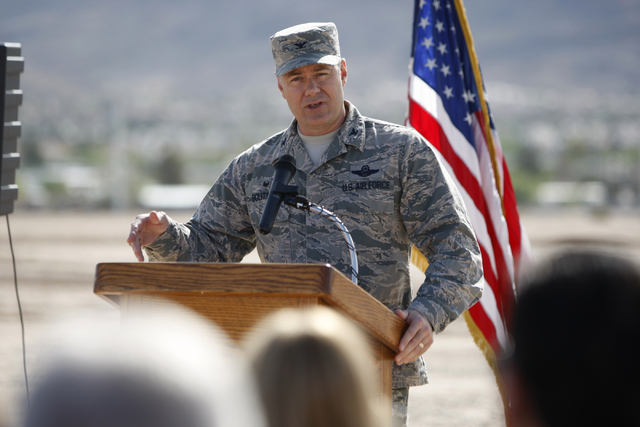 U.S. Air Force Col. Richard Boutwell speaks during a ground breaking ceremony for the Nellis Solar Array II project at Nellis Air Force Base in Las Vegas Tuesday, March 24, 2015. The 15 megawatt p ...