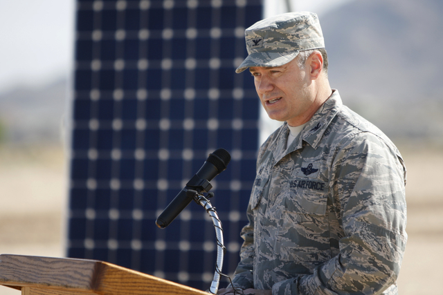 U.S. Air Force Col. Richard Boutwell speaks during a ground breaking ceremony for the Nellis Solar Array II project at Nellis Air Force Base in Las Vegas Tuesday, March 24, 2015. The 15 megawatt p ...
