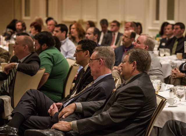 People listen during Newsfeed Breakfast at the Four Seasons Hotel Las Vegas on Tuesday, March 17, 2015. The event discussed K-12 education was sponsored by the Las Vegas Metro Chamber of Commerce  ...