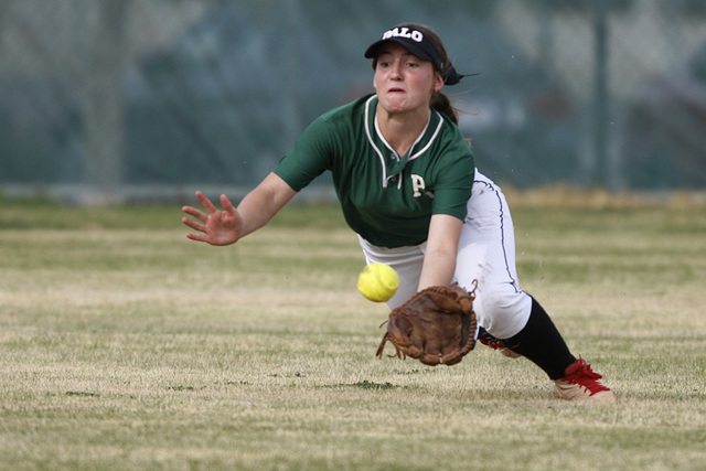 Palo Verde's Makall Whetten (1) makes a diving catch in the second inning in their softball game against Rancho at Rancho High School in Las Vegas Tuesday, March 17, 2015. Palo Verde won 10-0. (Er ...