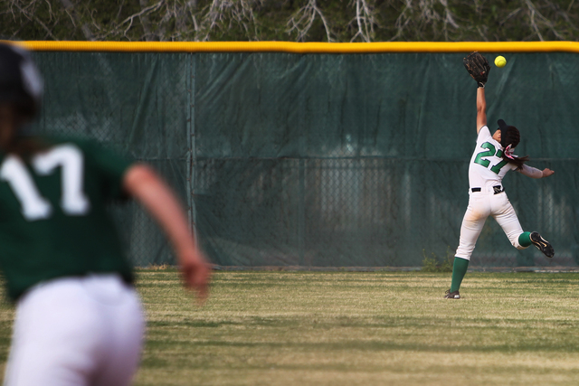 Rancho's Katerina Anthony (27) is short for a catch in center field in their softball game against Palo Verde at Rancho High School in Las Vegas Tuesday, March 17, 2015. Palo Verde won 10-0. (Erik ...